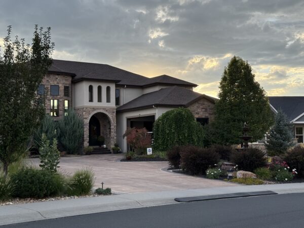 Residential home in Windsor Colorado with clean modern landscaping, featured on Bellas Mountain Vacation Cleaning for vacation rental and deep cleaning services
