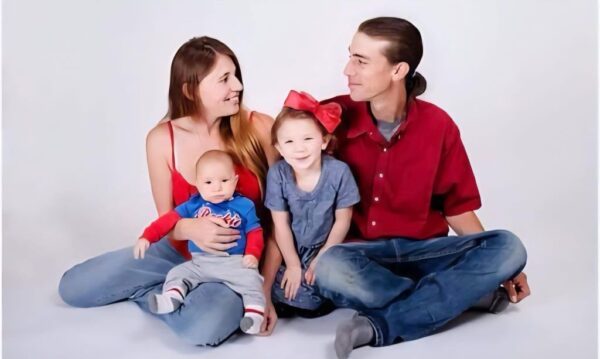 Owner of Bellas Mountain Vacation Cleaning with her family sitting together, representing local Fort Collins Colorado cleaning company values.
